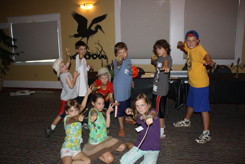 At Dodge Nature Center's Dodgewarts camp, witches and wizards show off their handmade wands.